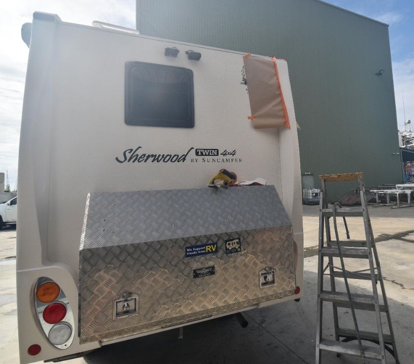 A White Rv With the Word Sherwood on the Back — Sandy Straits Marine In Urangan, QLD