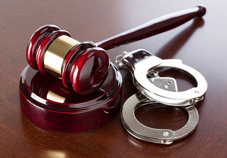 Gavel and Handcuffs — Springfield, TN — The Law Office of Joe R. “Jay” Johnson, II Gavel and Handcuffs — Springfield, TN — The Law Office of Joe R. “Jay” Johnson, II