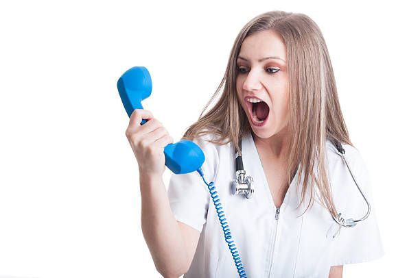 Sunrise Hospital. Patient-132, stock photo of an angry nurse on the phone Sunrise Hospital. Patient-132, stock photo of an angry nurse on the phone