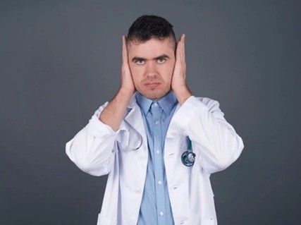 Nevada Orthopedic, Dr. Kevin Golshani,  Patient-377, stock photo of a doctor who is not listening.