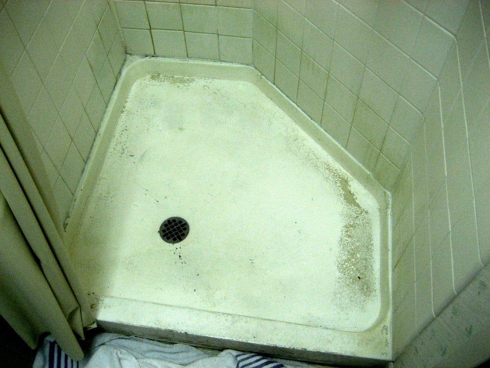 Sunrise Hospital _dirty, worn out shower in  patient room