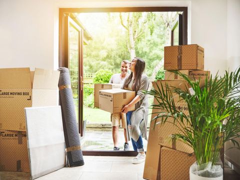 New homeowners receiving the keys to their Texas home