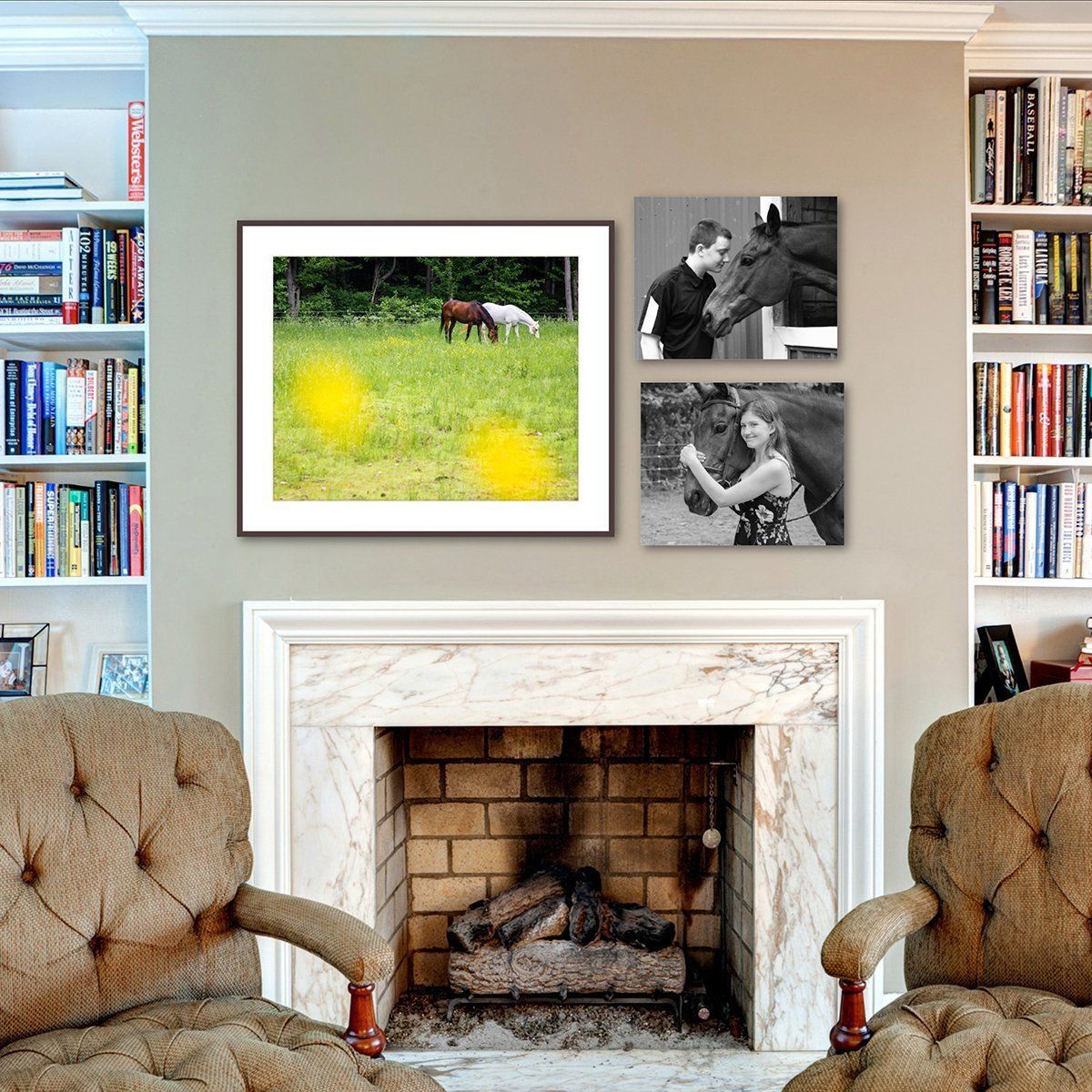 Living room fireplace with framed horse art, black-and-white photos, bookshelves, and tufted chairs in Fishers, IN.