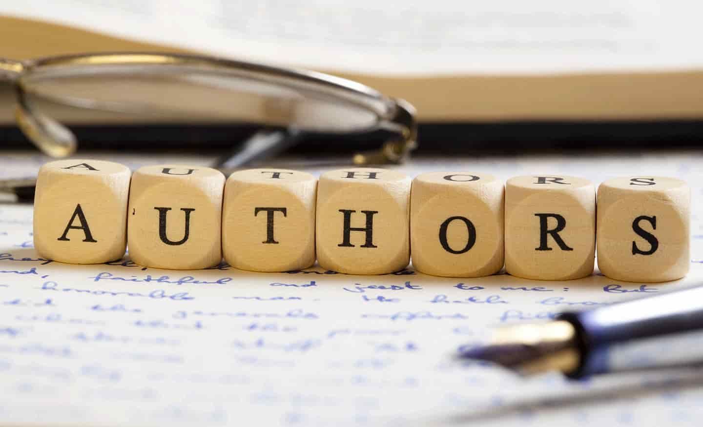 The word authors is written on wooden cubes