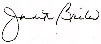 A close up of a person 's signature on a white background.