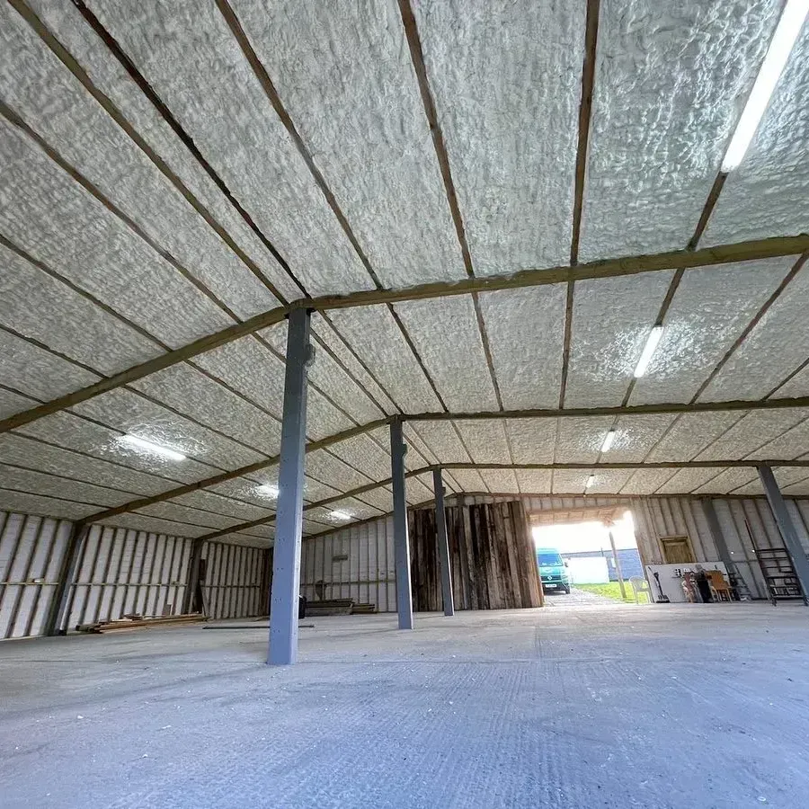 A large warehouse with a lot of foam on the ceiling.