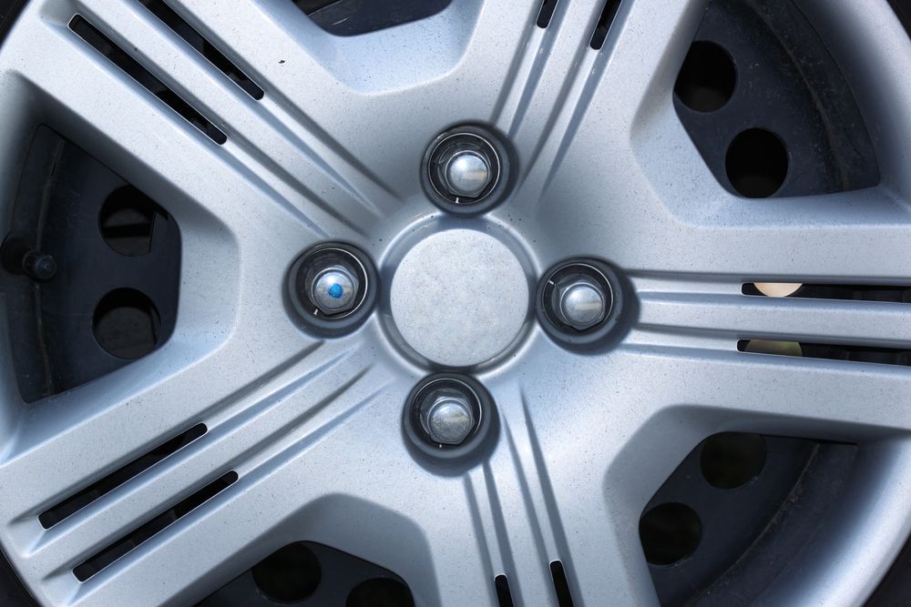 A Close Up Of A Car Wheel With Nuts On It — Manning Smash & Auto Repairs In Wingham, NSW