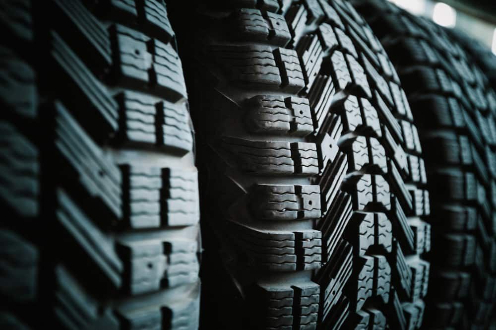 A Close Up Of A Stack Of Tires In A Warehouse — Manning Smash & Auto Repairs In Wingham, NSW