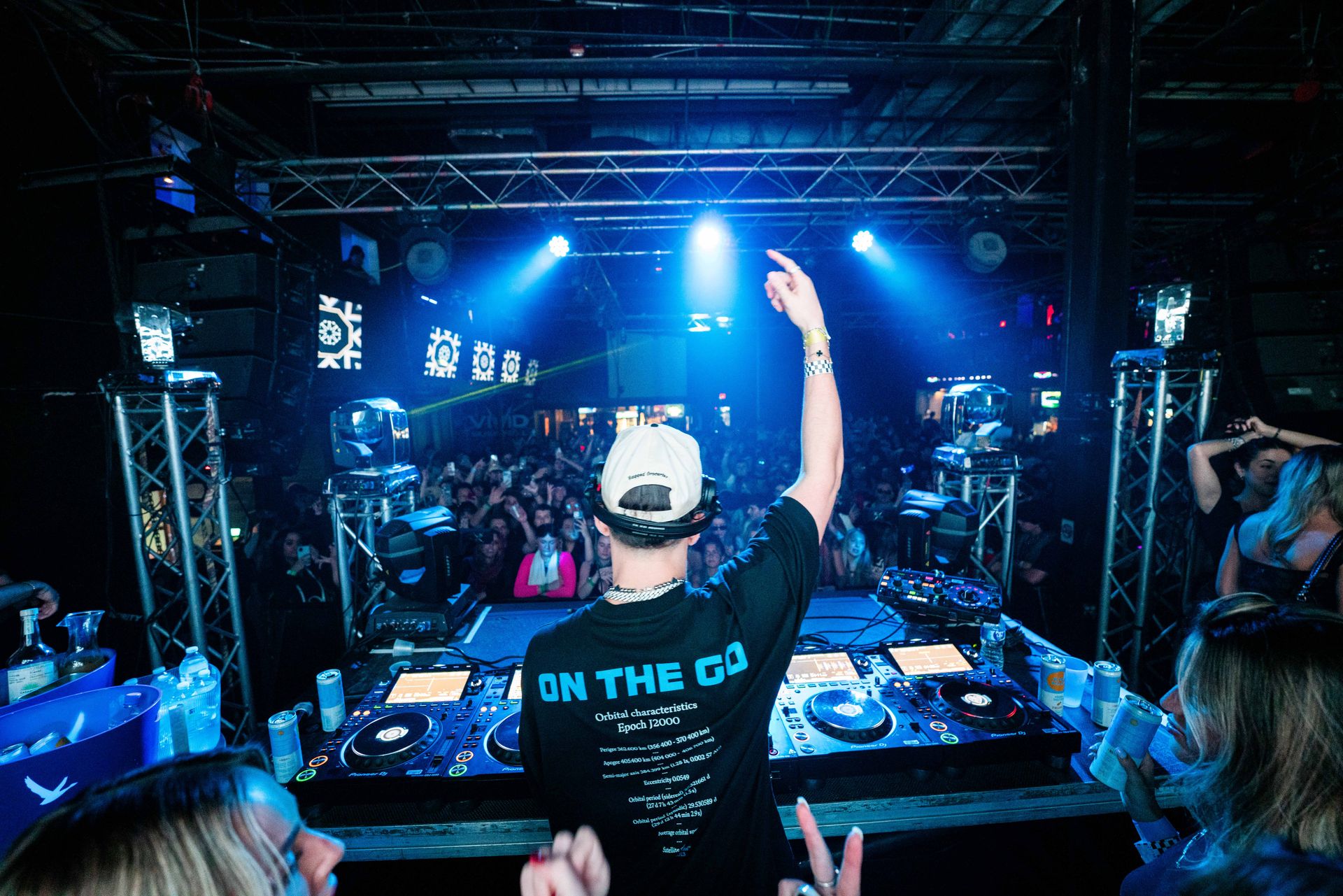 A man wearing a black shirt that says on the go
