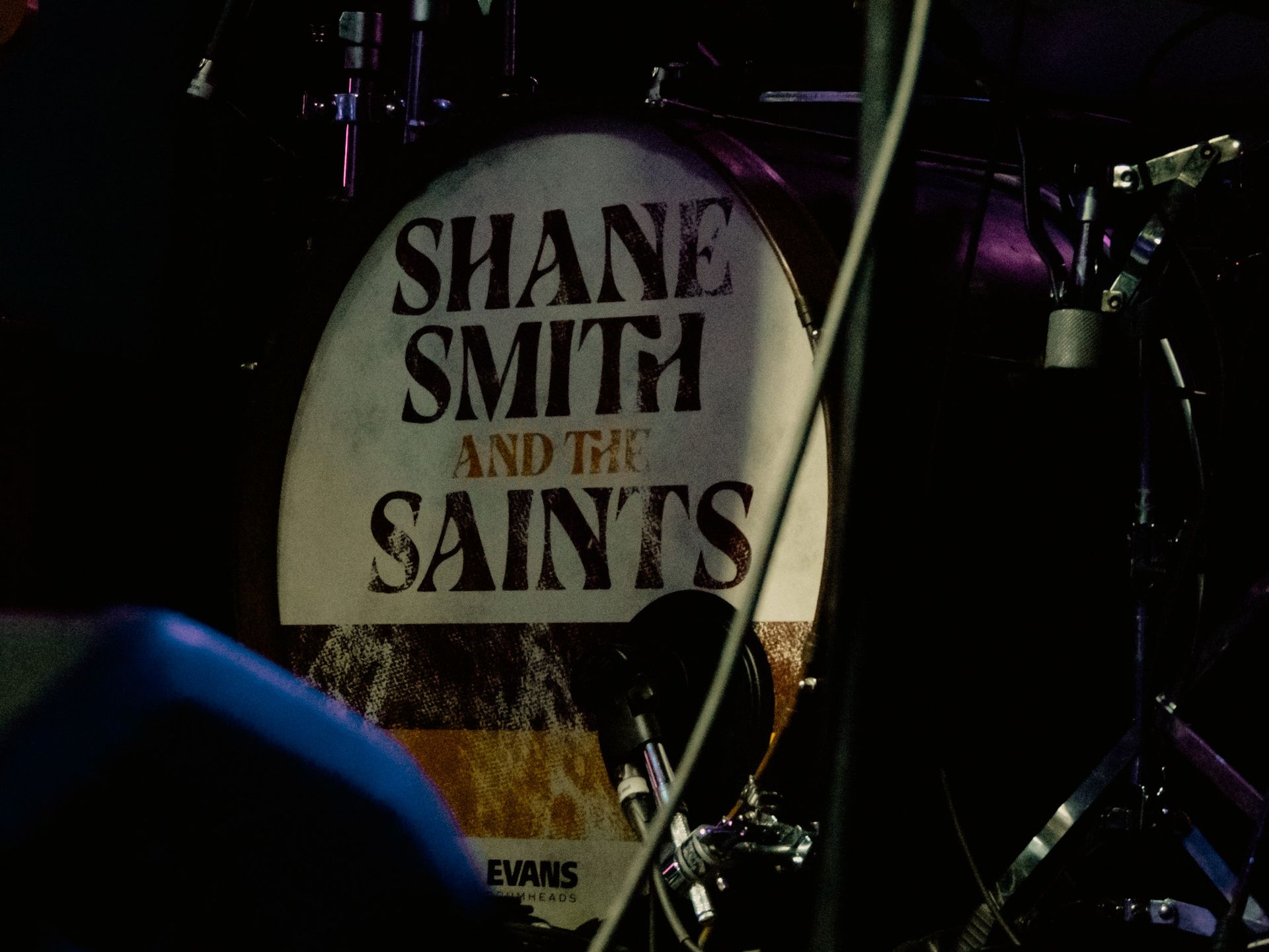 A drum with shane smith and the saints written on it