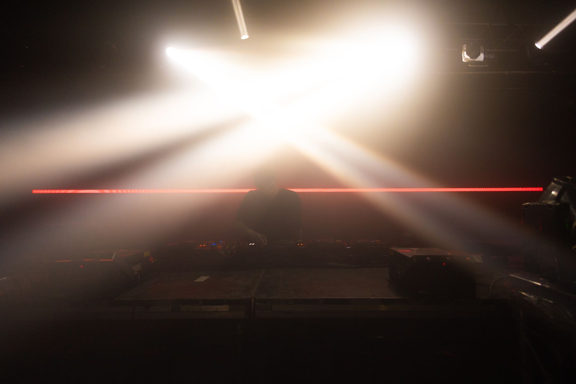 A stage with a lot of lights shining on it