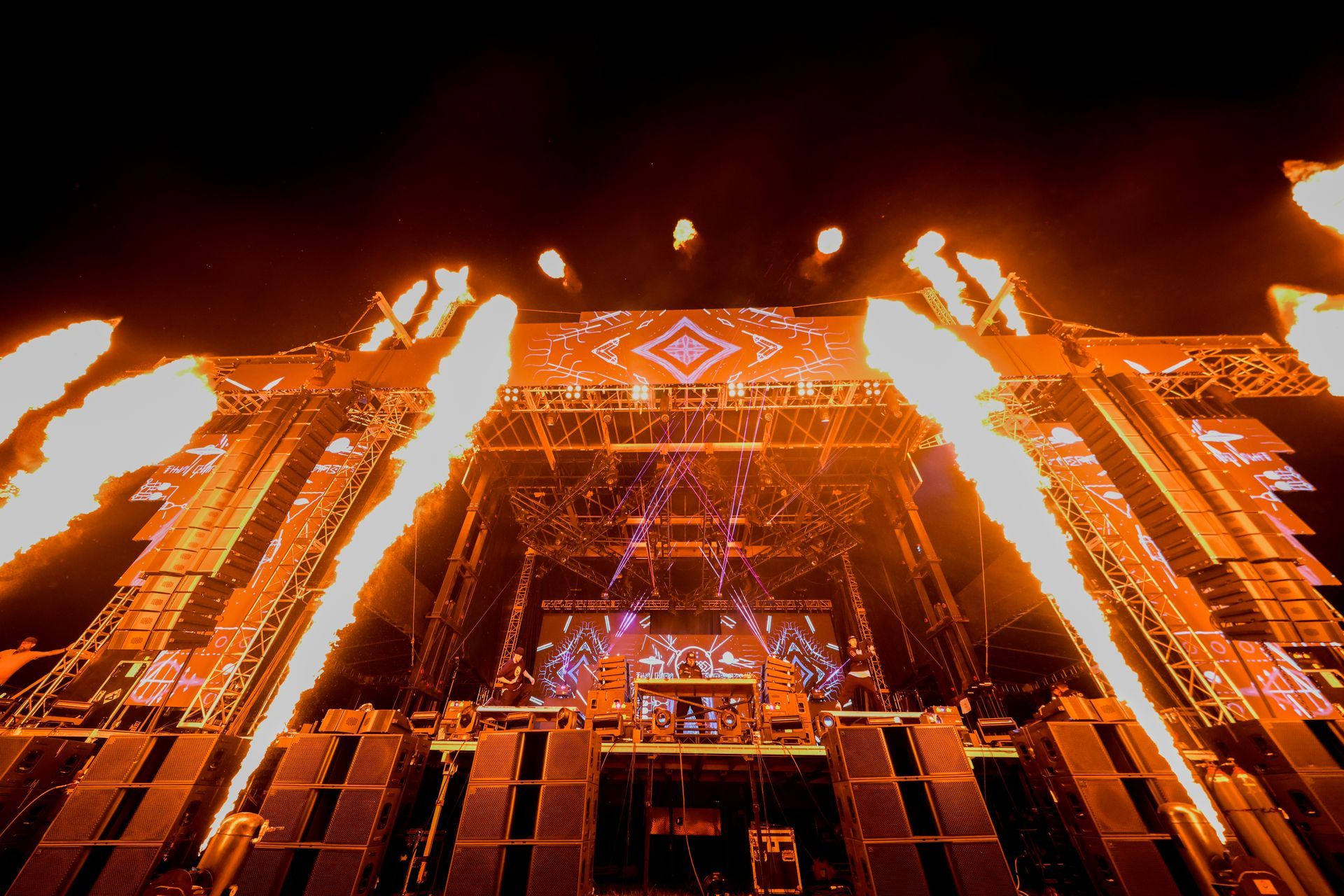 A stage with a lot of fire coming out of it