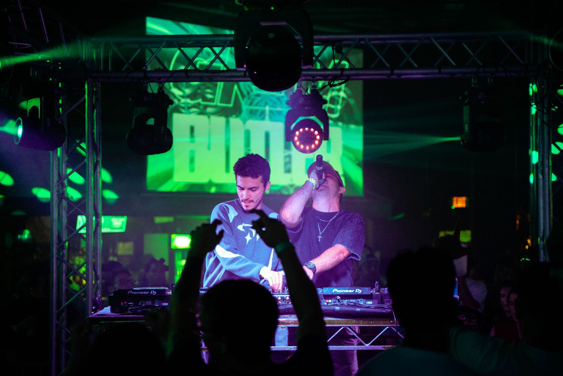 Two DJ's about to hit the drop