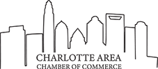 A black and white line drawing of the Charlotte skyline above the text
