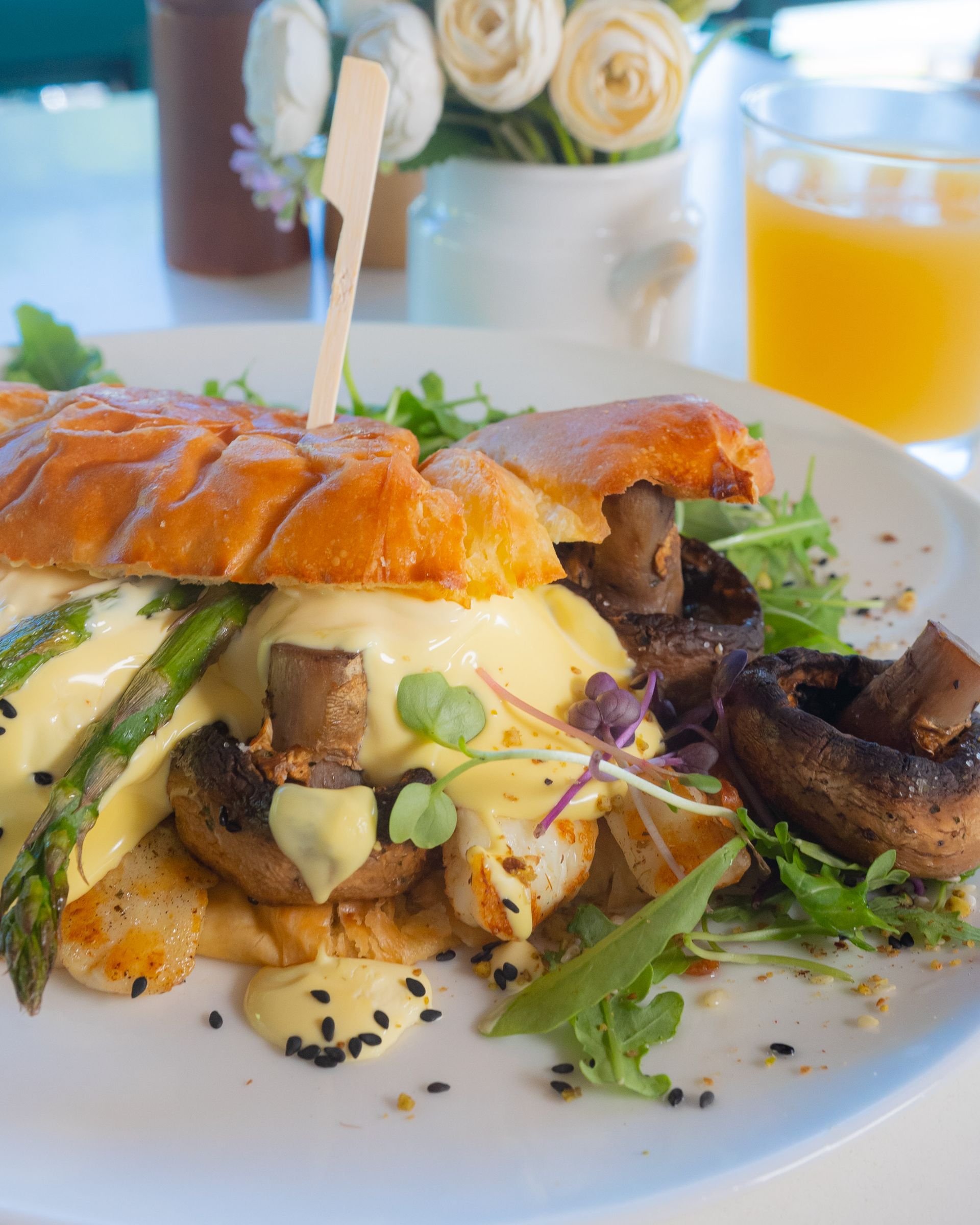 A Close Up of a Hamburger on a Plate — My Rainbow Bakery, Cafe & Catering in Cannonvale, QLD