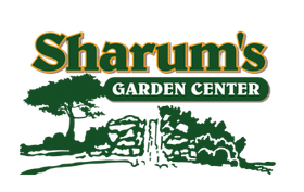 a logo for sharum 's garden center with trees in the background