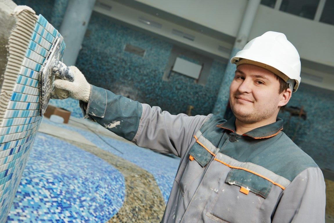 pool installation professional hard at work