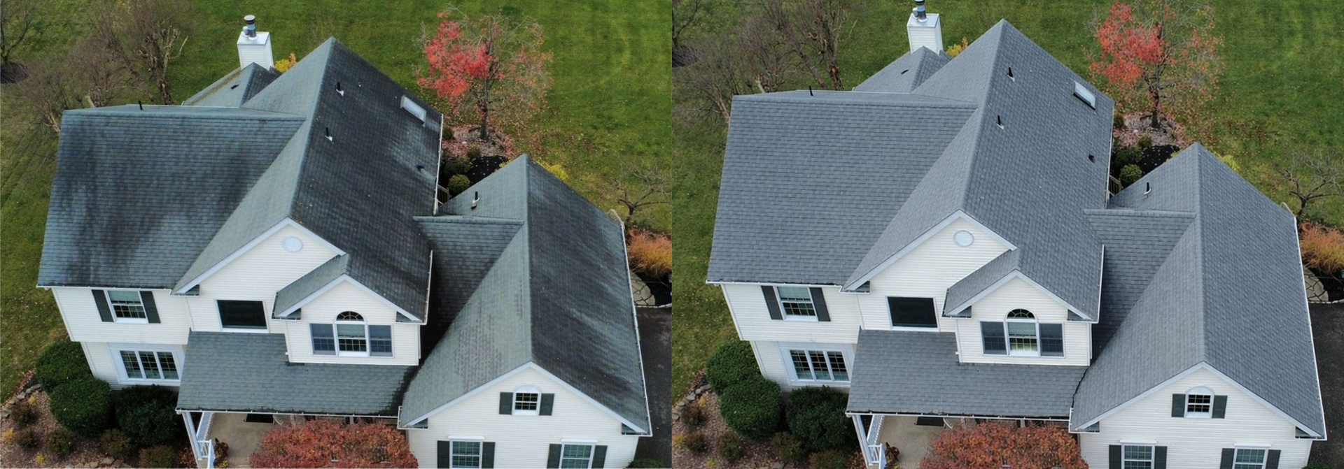 Side-by-side aerial view of two gray houses with dark roofs, surrounded by trees and a road