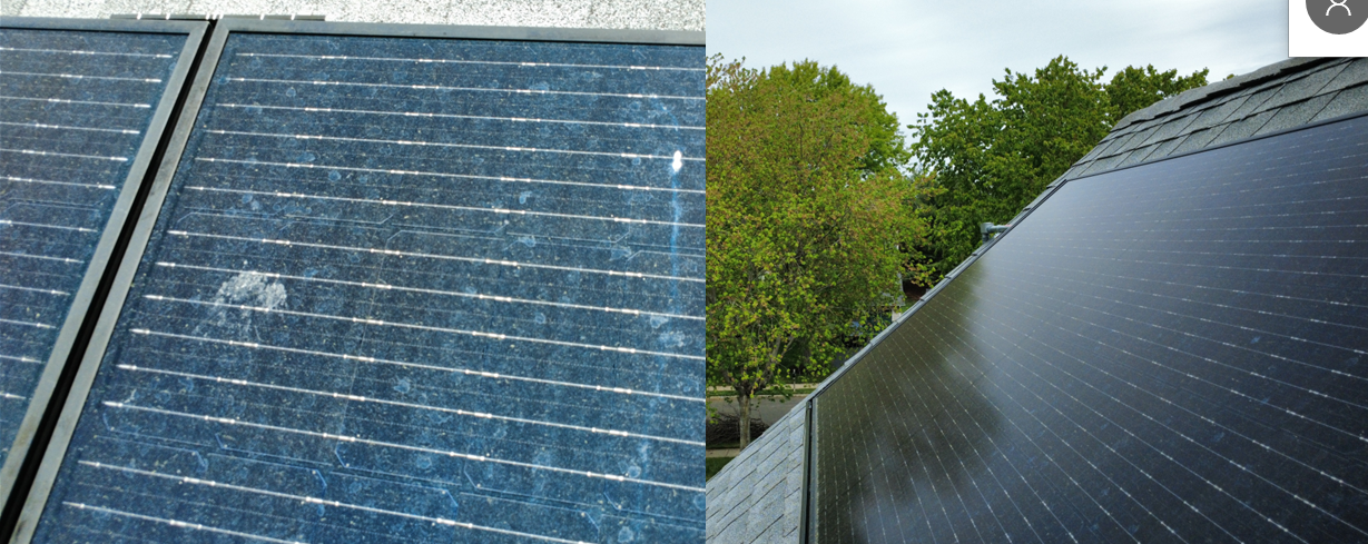 Close-up of two dirty solar panels outdoors, one blue and one black, with trees in the background