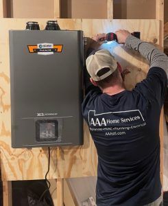 AAA plumbersInstallingTankless Large | 1