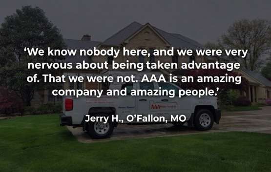White pickup on a dark lawn with a quote praising AAA and Jerry H. O'Fallon, MO