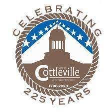 Ottville 225th anniversary logo with brown tower, blue stars, and “Celebrating 225 Years” text