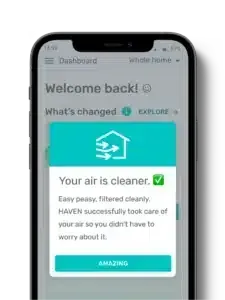 Smartphone screen showing a cleaner status pop-up with a teal header and an “AMAZING” button