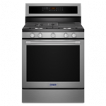 Stainless steel freestanding gas range oven with four burners and digital control panel.