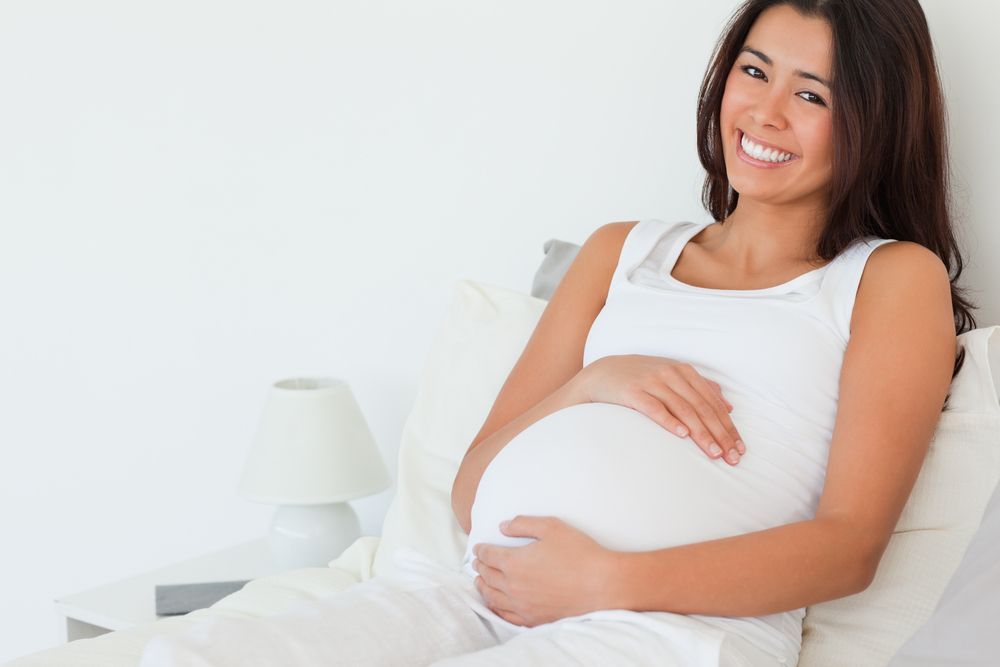 Pregnant Woman in White Tank Top — R & R Relaxation and Remedial In Grafton, NSW