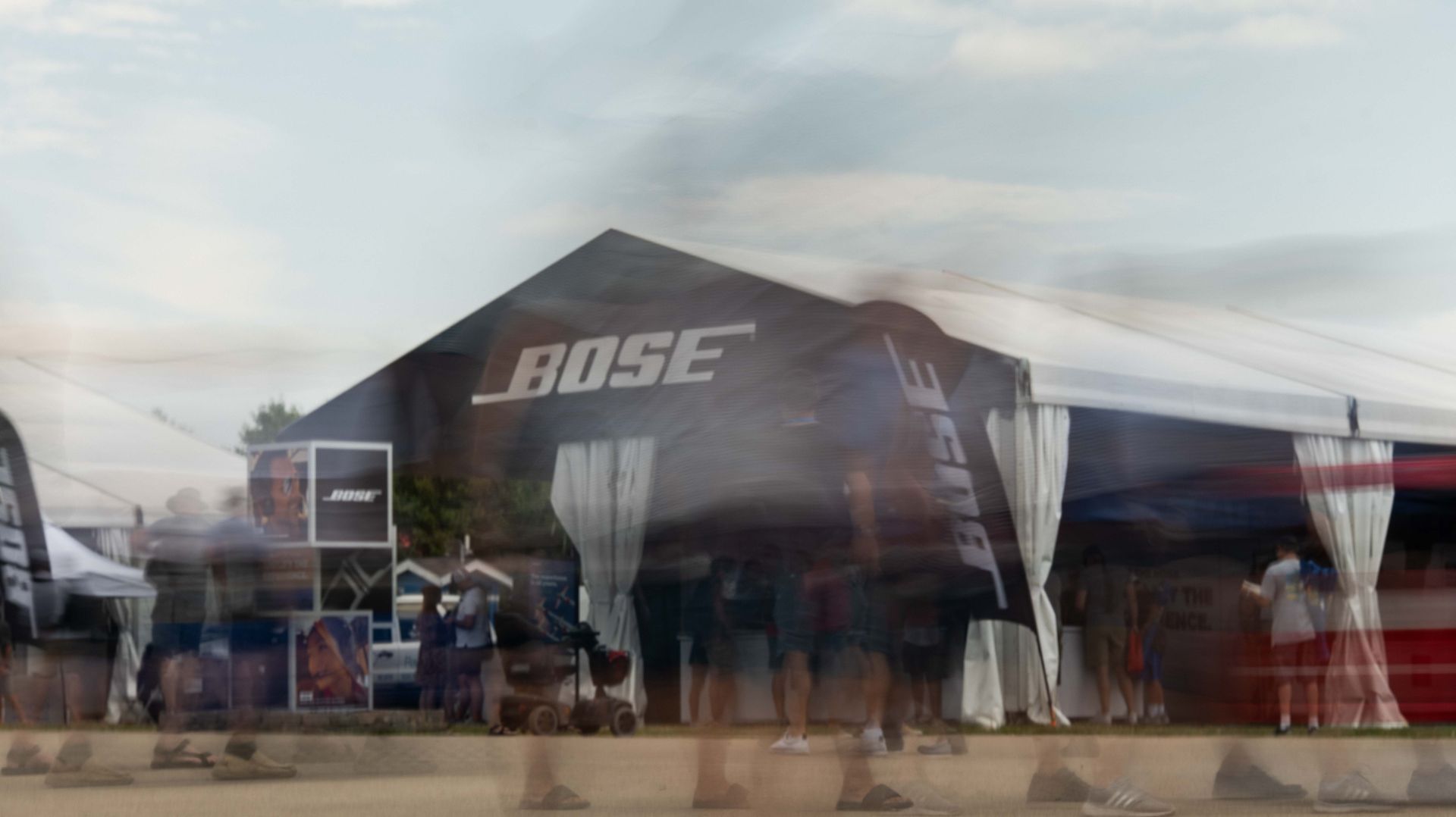 Bose Aviation exhibit at EAA AirVenture Oshkosh showcasing aviation headsets and pilot communication technology.