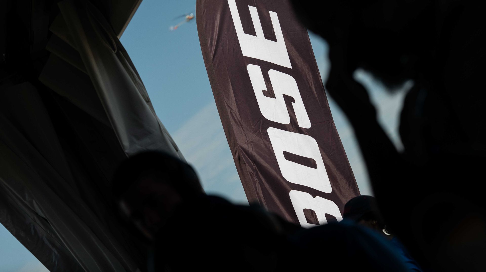 Bose Aviation display at EAA AirVenture featured in commercial photography and event video production.