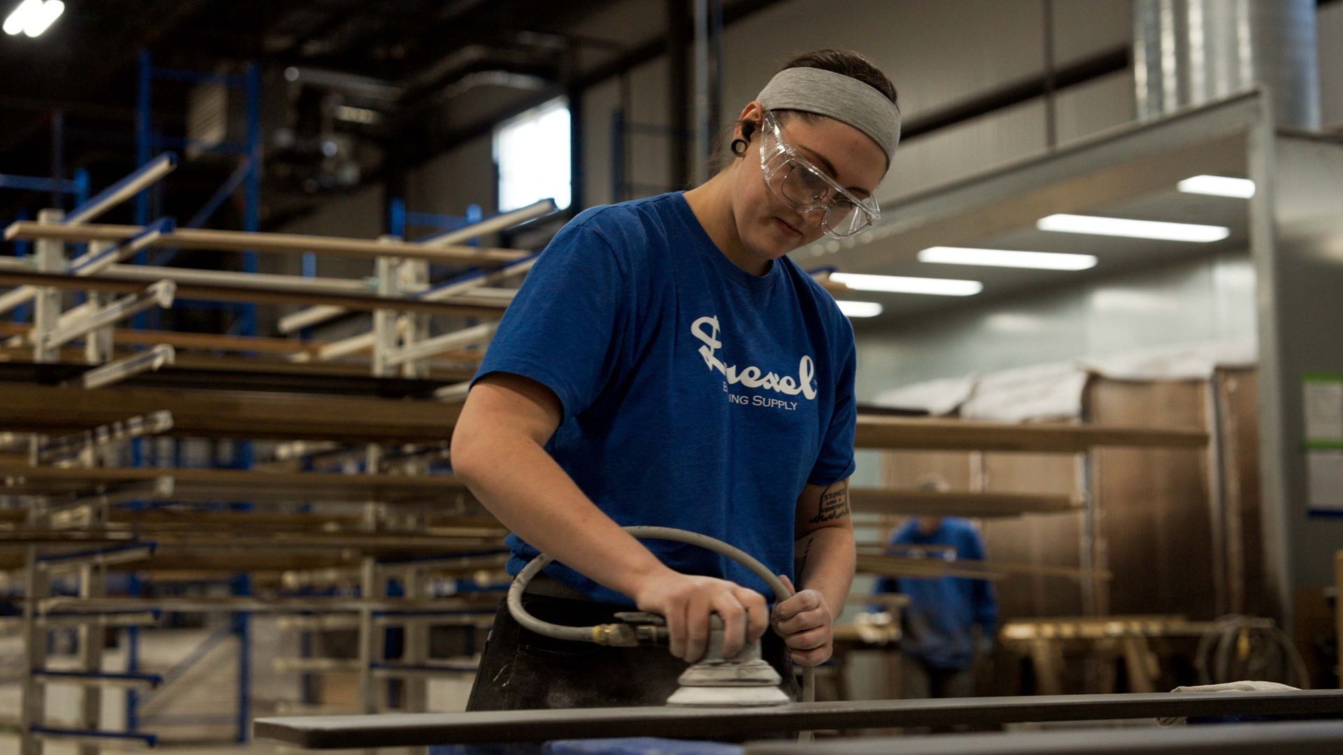 Manufacturing employee at Drexel Building Supply featured in a recruitment video production highlighting skilled careers in Wisconsin.