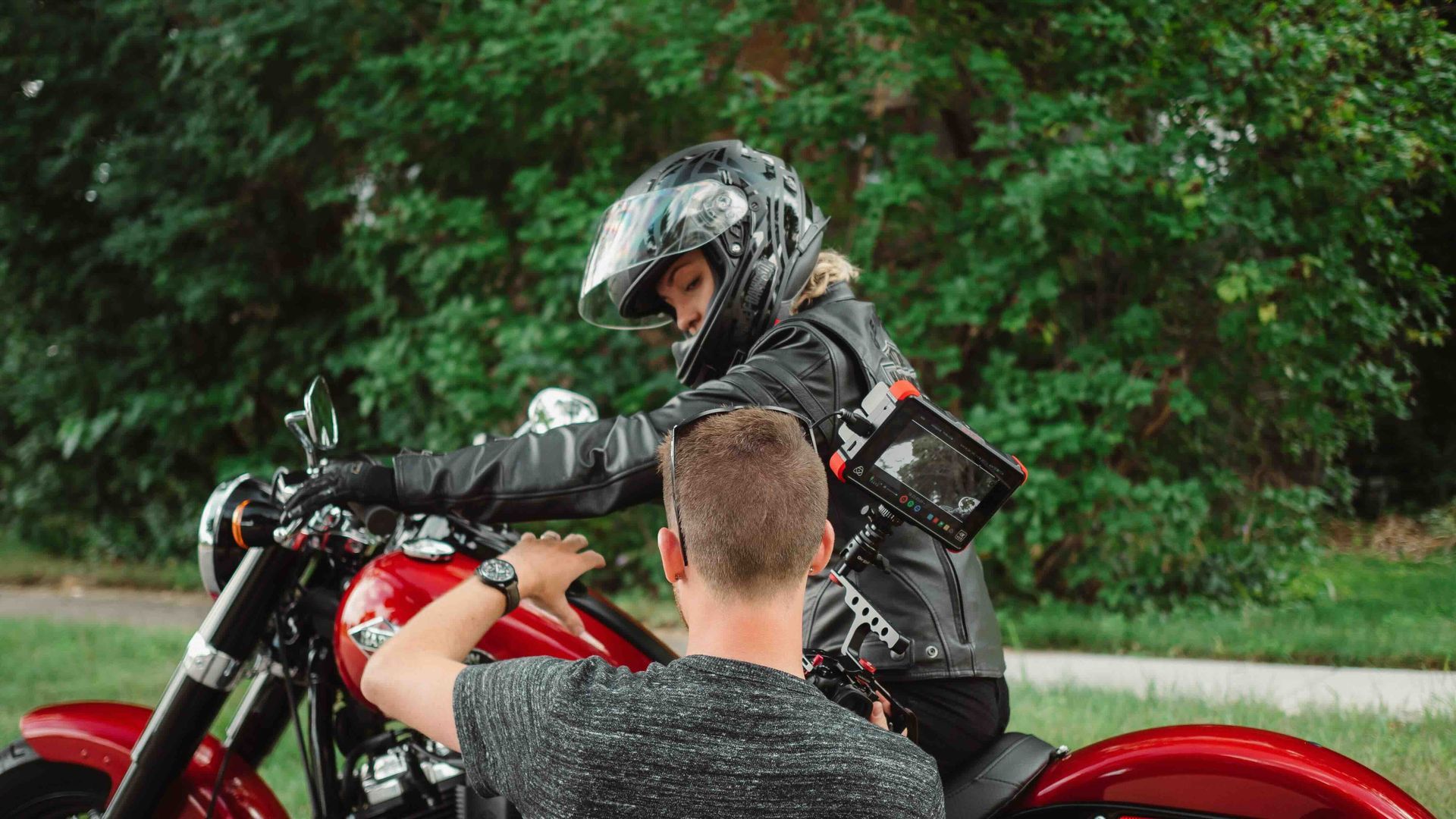 Mirrorless Productions directing a Harley-Davidson commercial video with on-location talent and motorcycles.