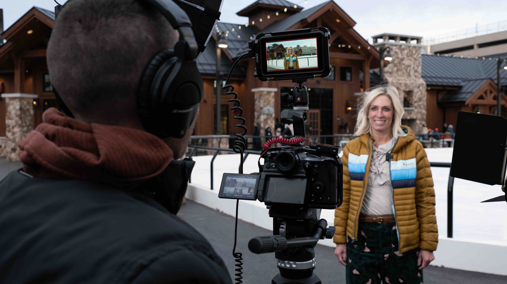 Mirrorless Productions filming a tourism video interview at Neenah Plaza Park in Wisconsin for Holiday campaign.