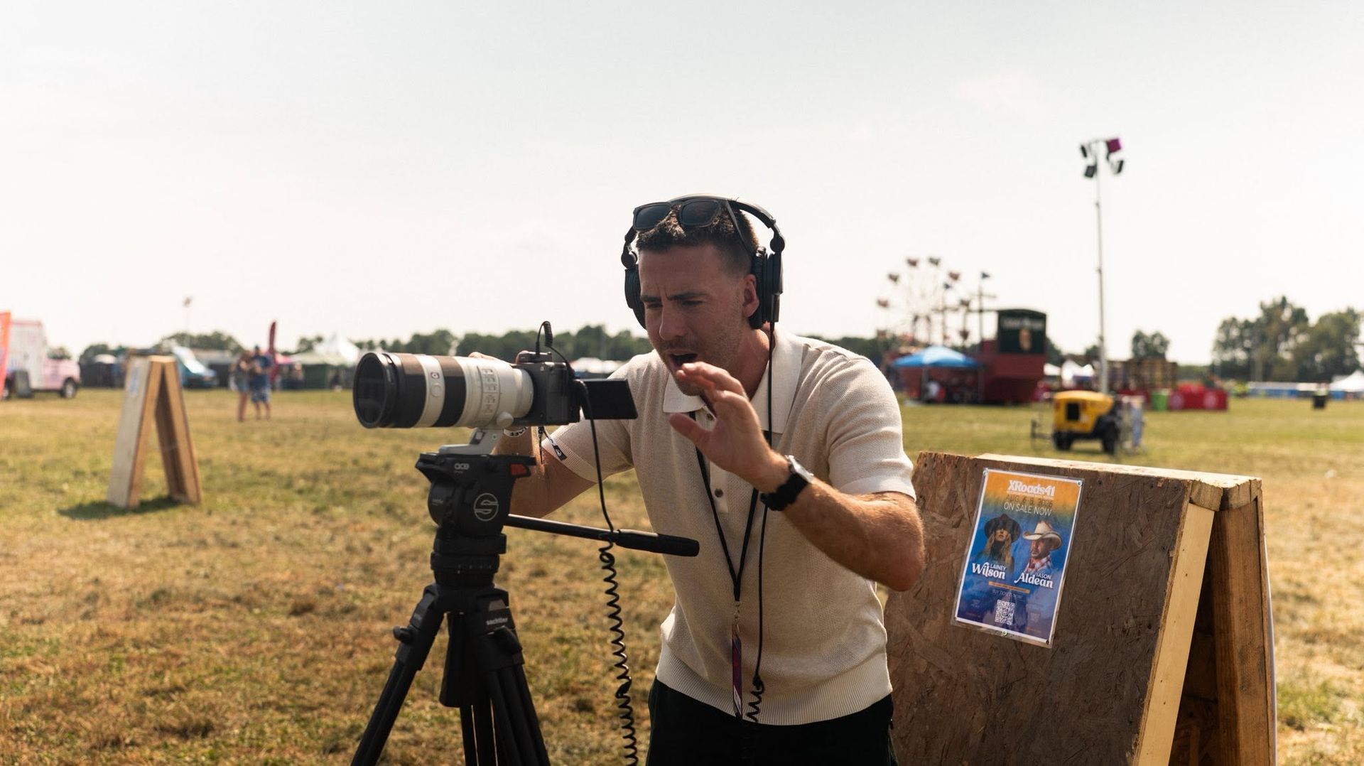 Alex Belville filming live event coverage at XRoads41 Music Festival in Wisconsin.