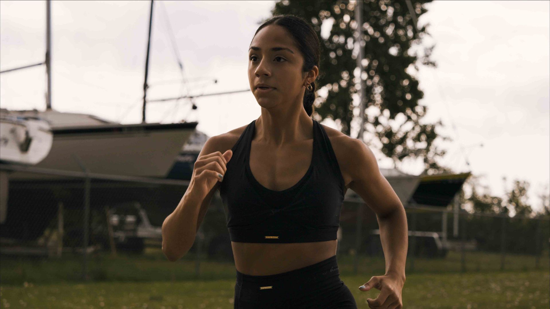 Woman running during a Wisconsin recovery awareness commercial video production for the Wisconsin Department of Justice.