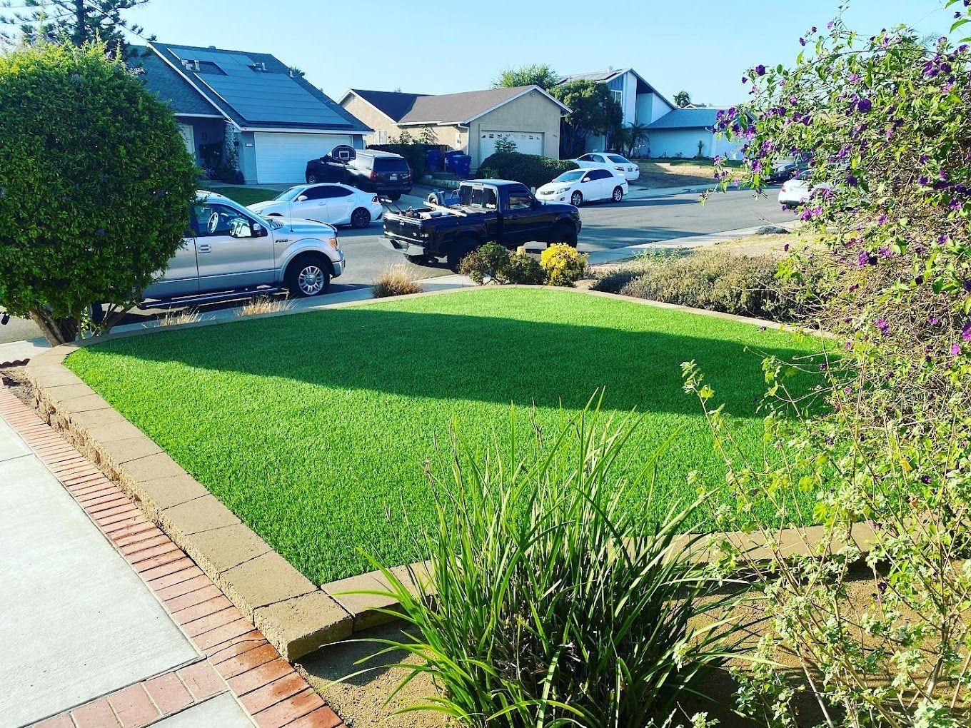 Artificial turf installation in the front yard by San Diego turf professionals