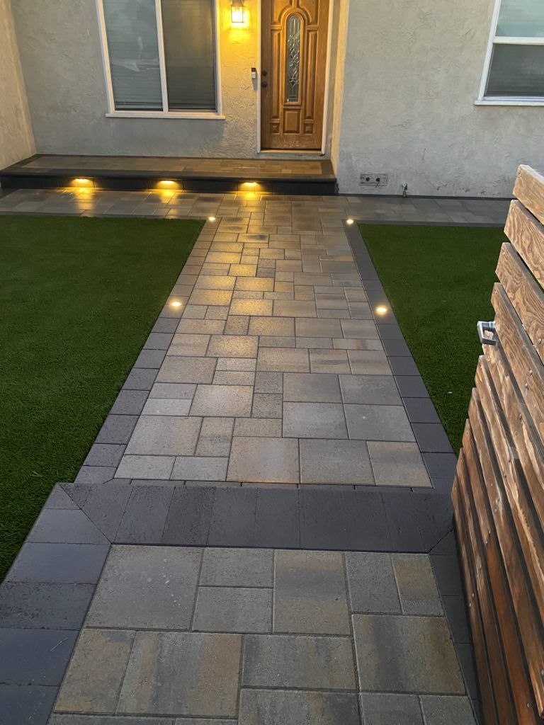 front yard with pavers and artificial turf landscaping in San Diego