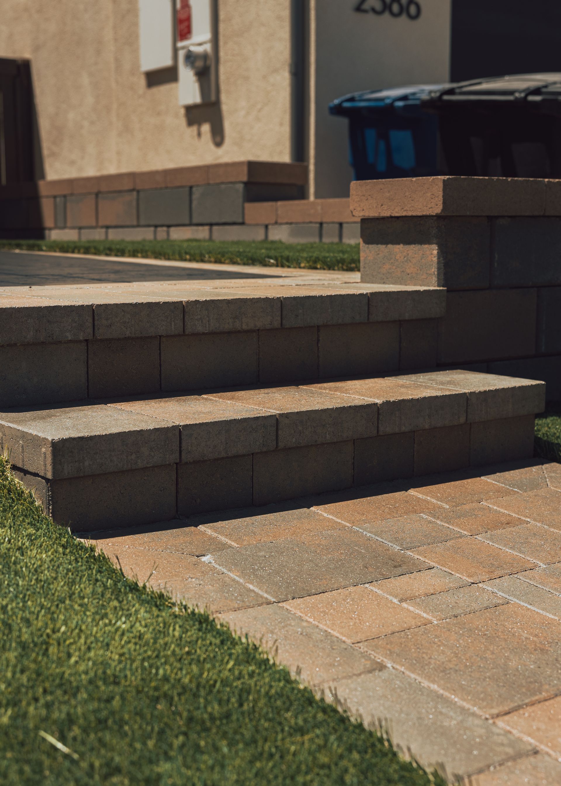 custom paver stairs design for sloped backyard landscape in San Diego