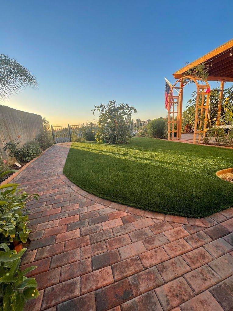 backyard patio with shade structure keeping outdoor space cool in san diego landscaping