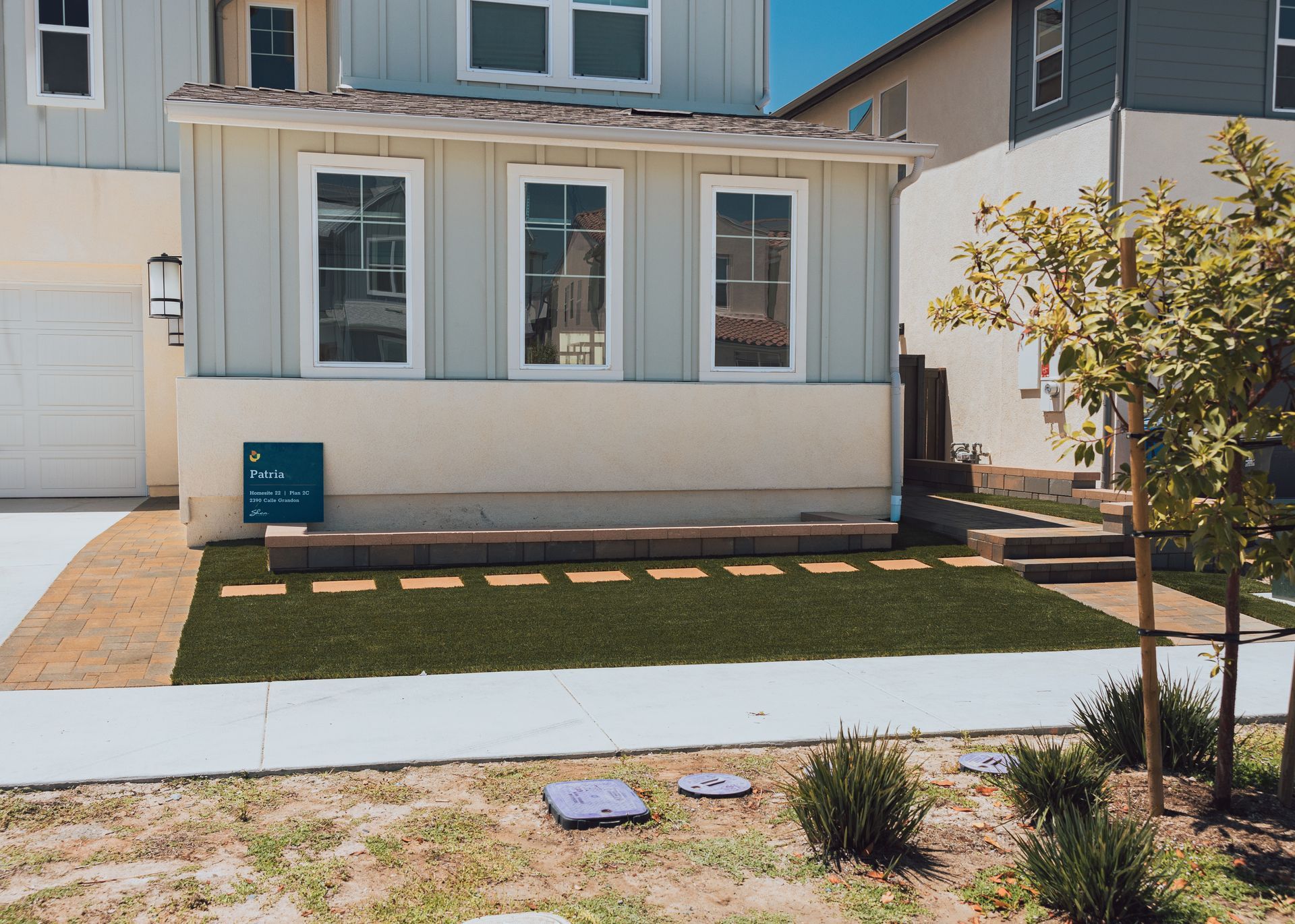 front yard landscape design for home in San Diego with plants and hardscape