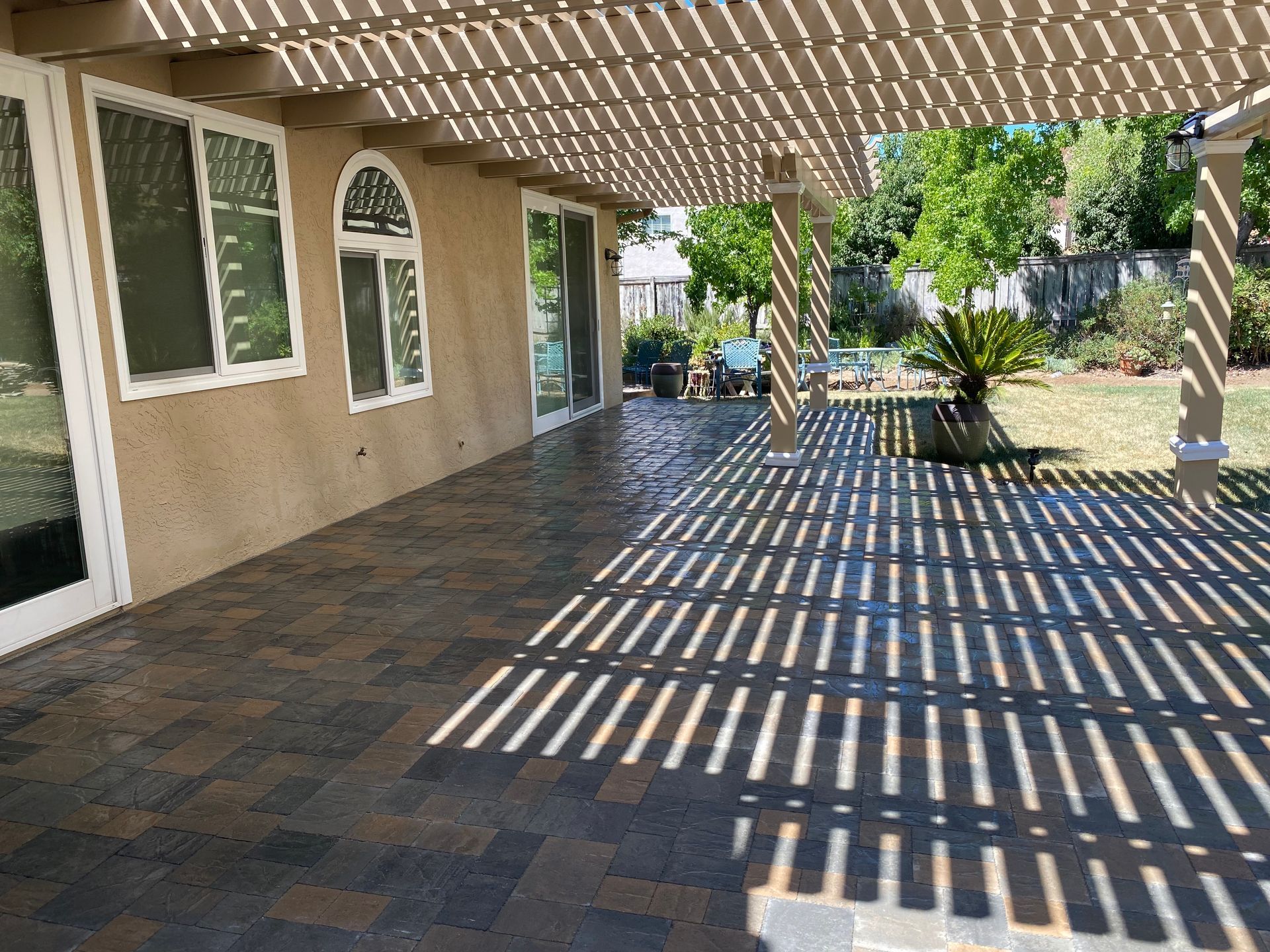 Custom paver patio in San Diego backyard with expert landscape design