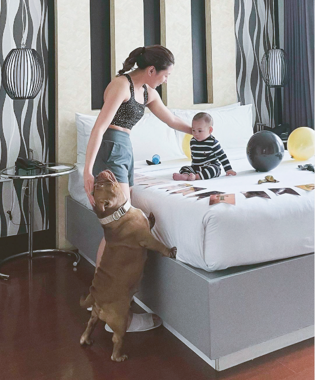 Guest enjoying spacious room amenities at family staycation makati accommodation.