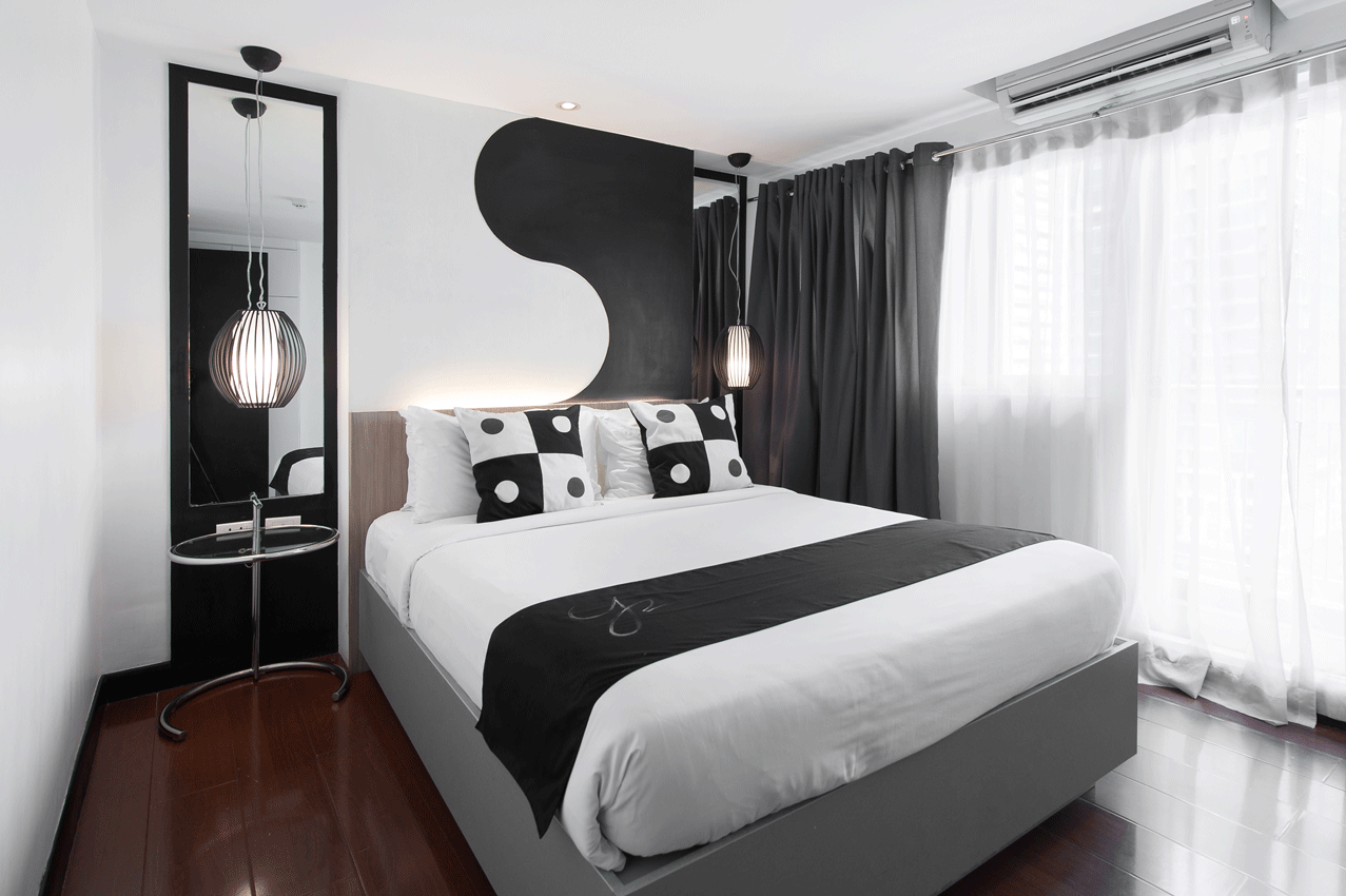 Queen bed in a Two Bedroom Premier at Y2 Residence Hotel, Poblacion Makati