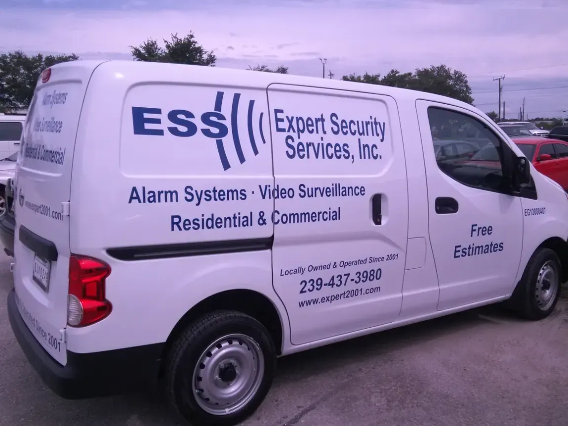 A white van with the word ess on it