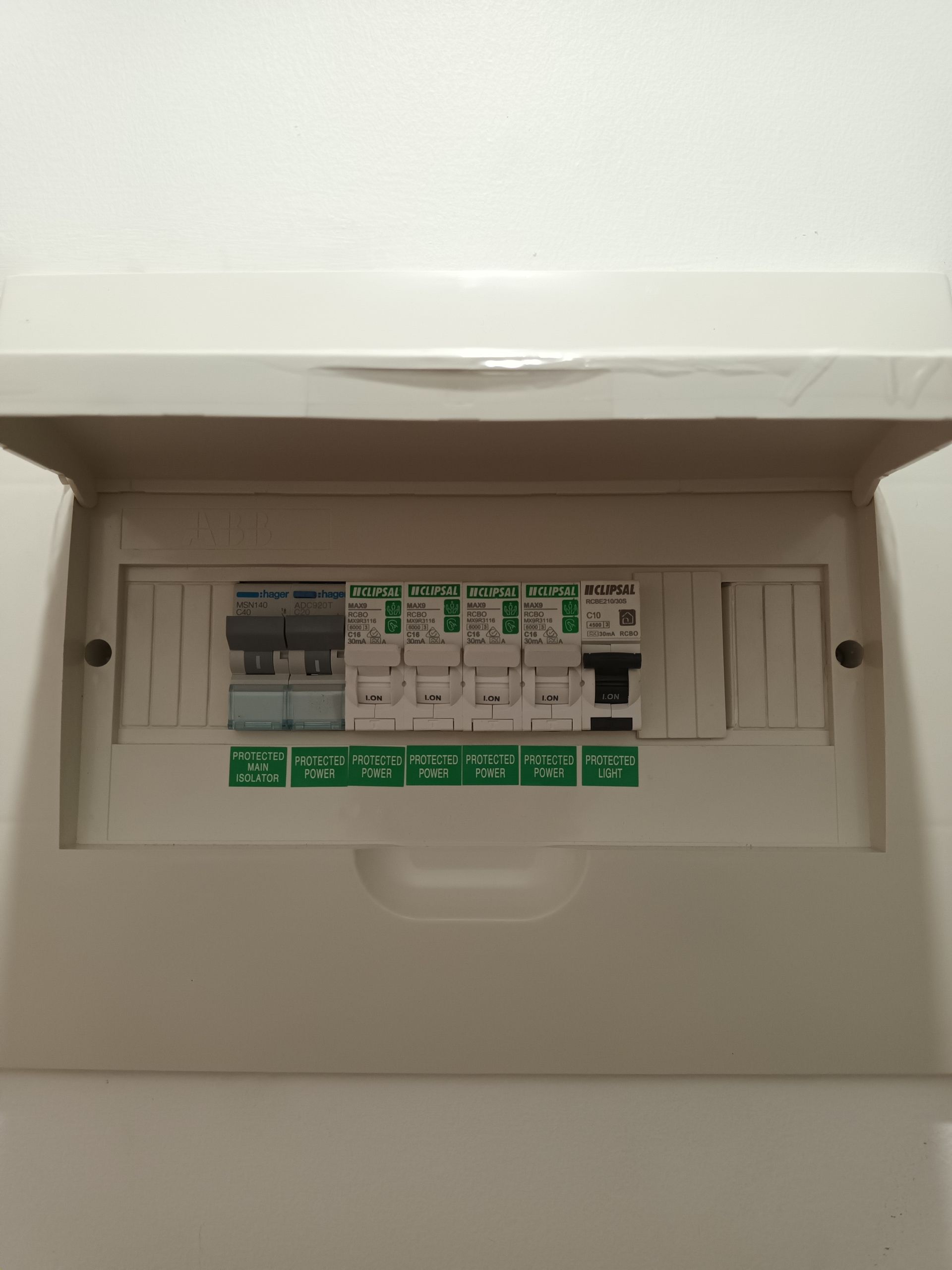 Electrical fuse box with switches in a white enclosure. — Ryphen Electrical in Highton, VIC
