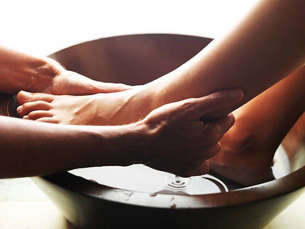 Woman is getting spa pedicure.