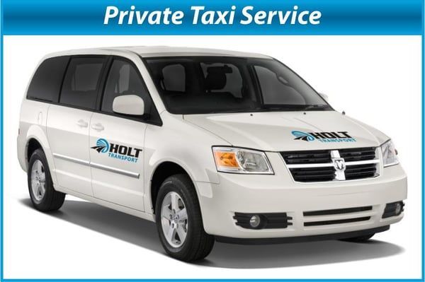 White private taxi van with “Private Taxi Service” banner and Holt logo on the side