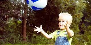 Little Boy Catching Beach Ball — Fairbanks, AK — Building Blocks