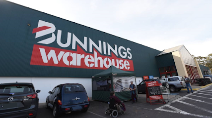 This is a picture of Bunnings Bendigo store front and car park with a B.B.Q going on